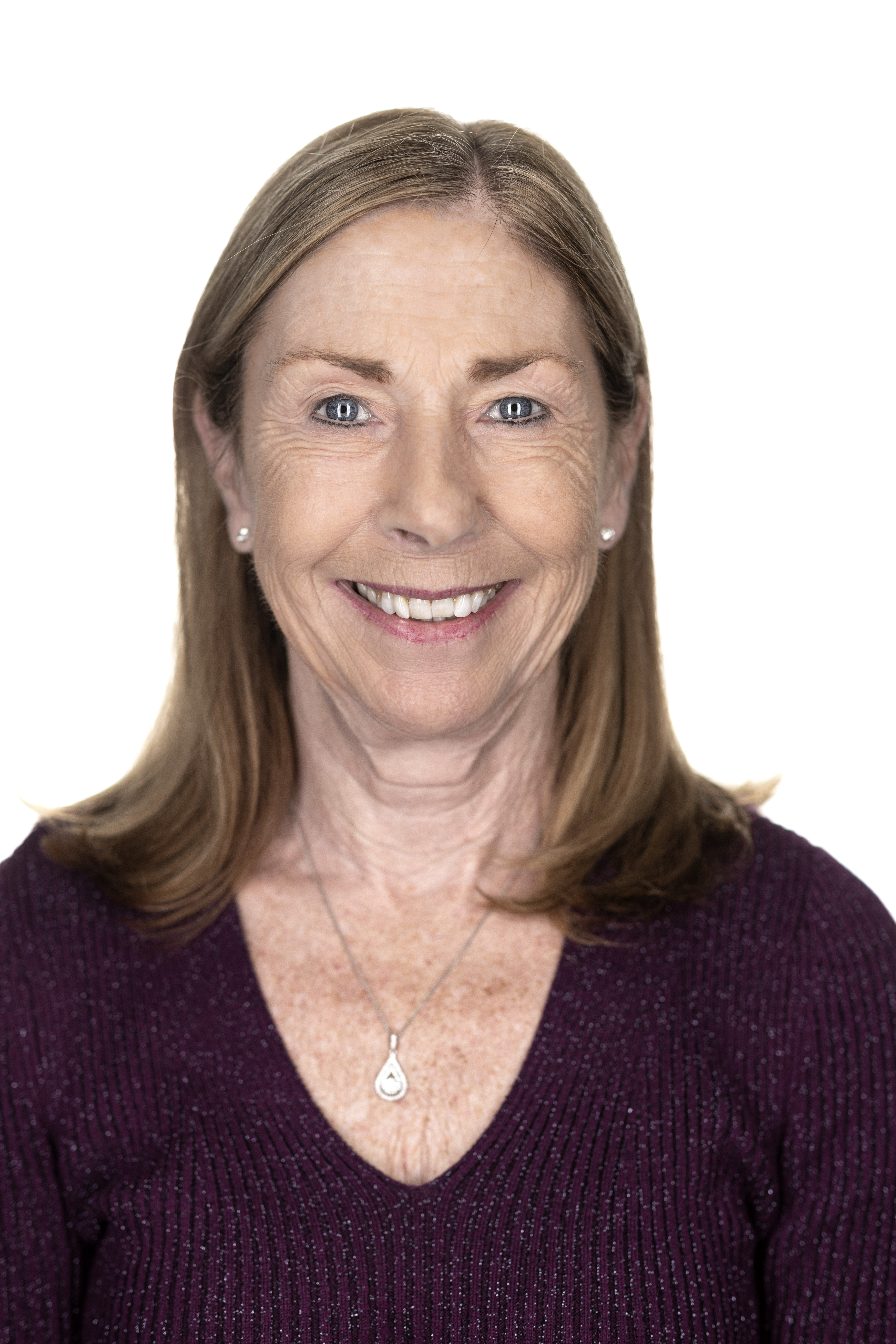 Close up portrait of a woman with a white background
