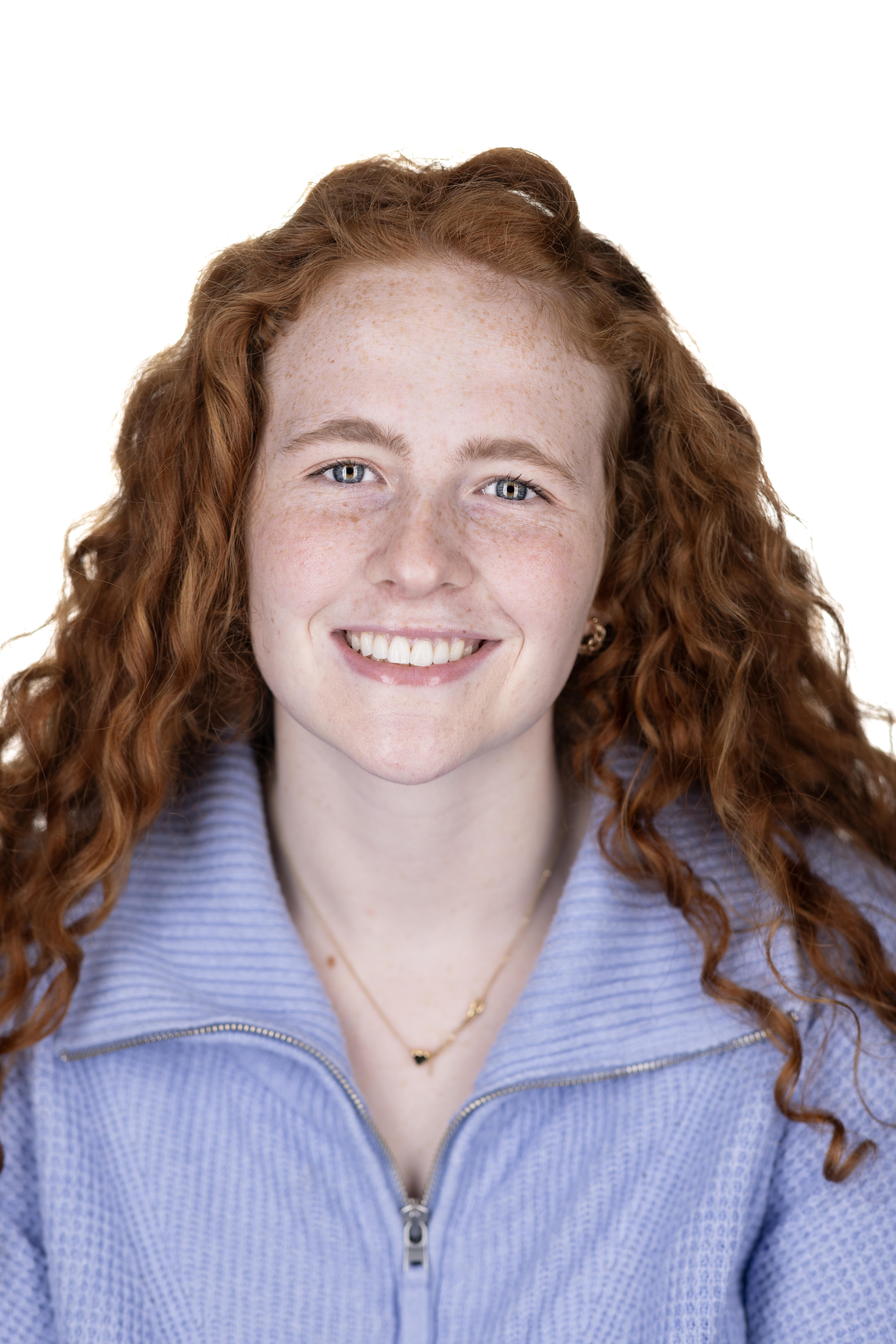 A portrait of a college student with a white background