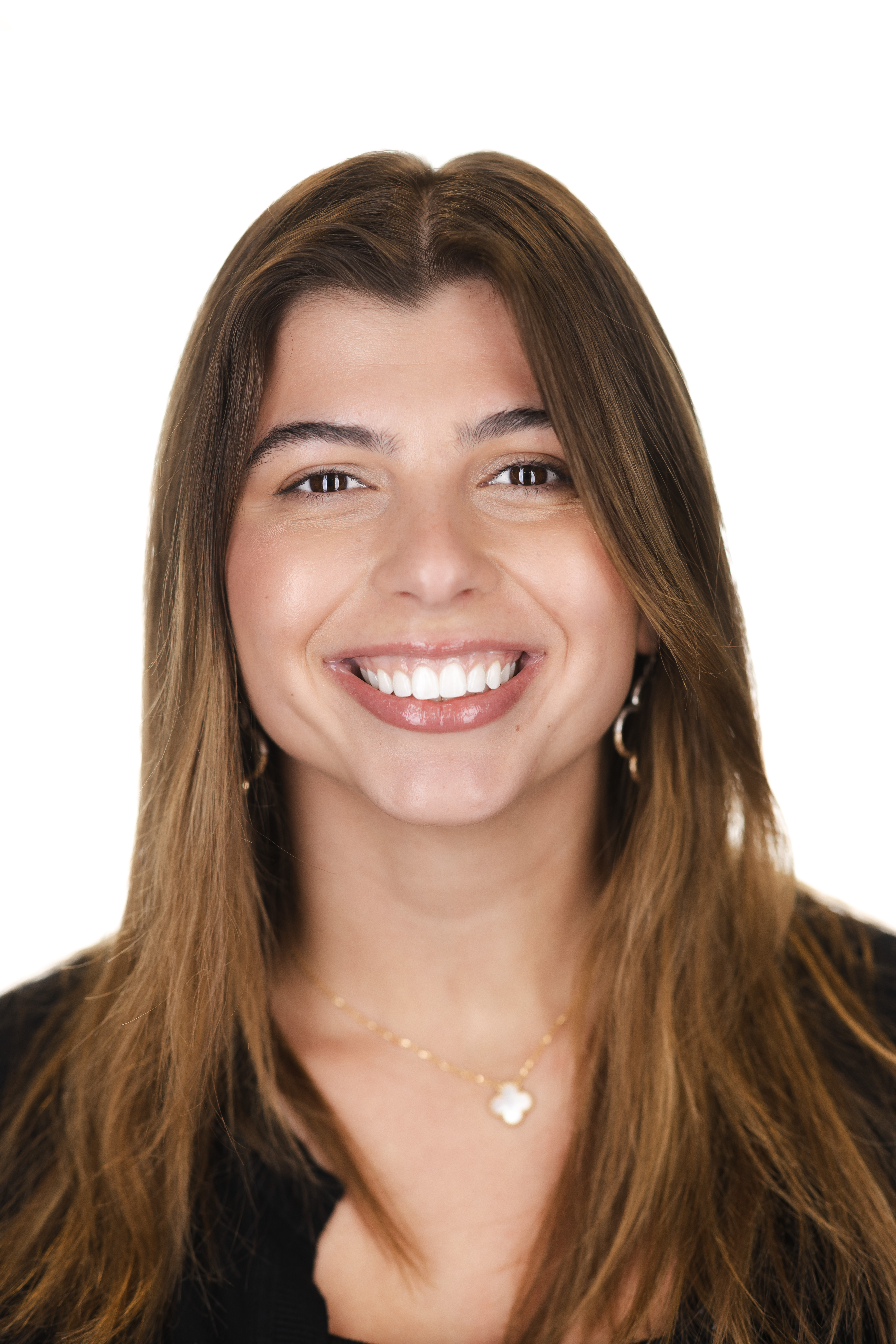 A portrait of a college student with a white background