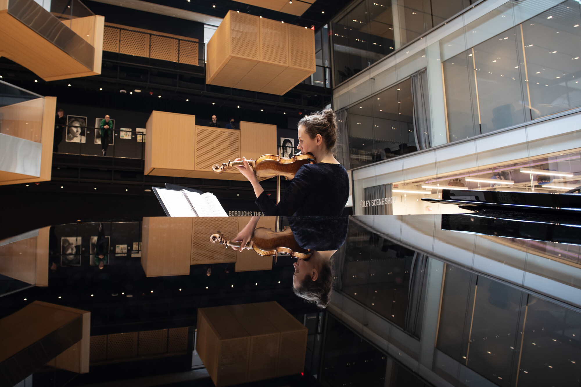 Violin performance in the Beehives at the Prior Performing Arts Center
