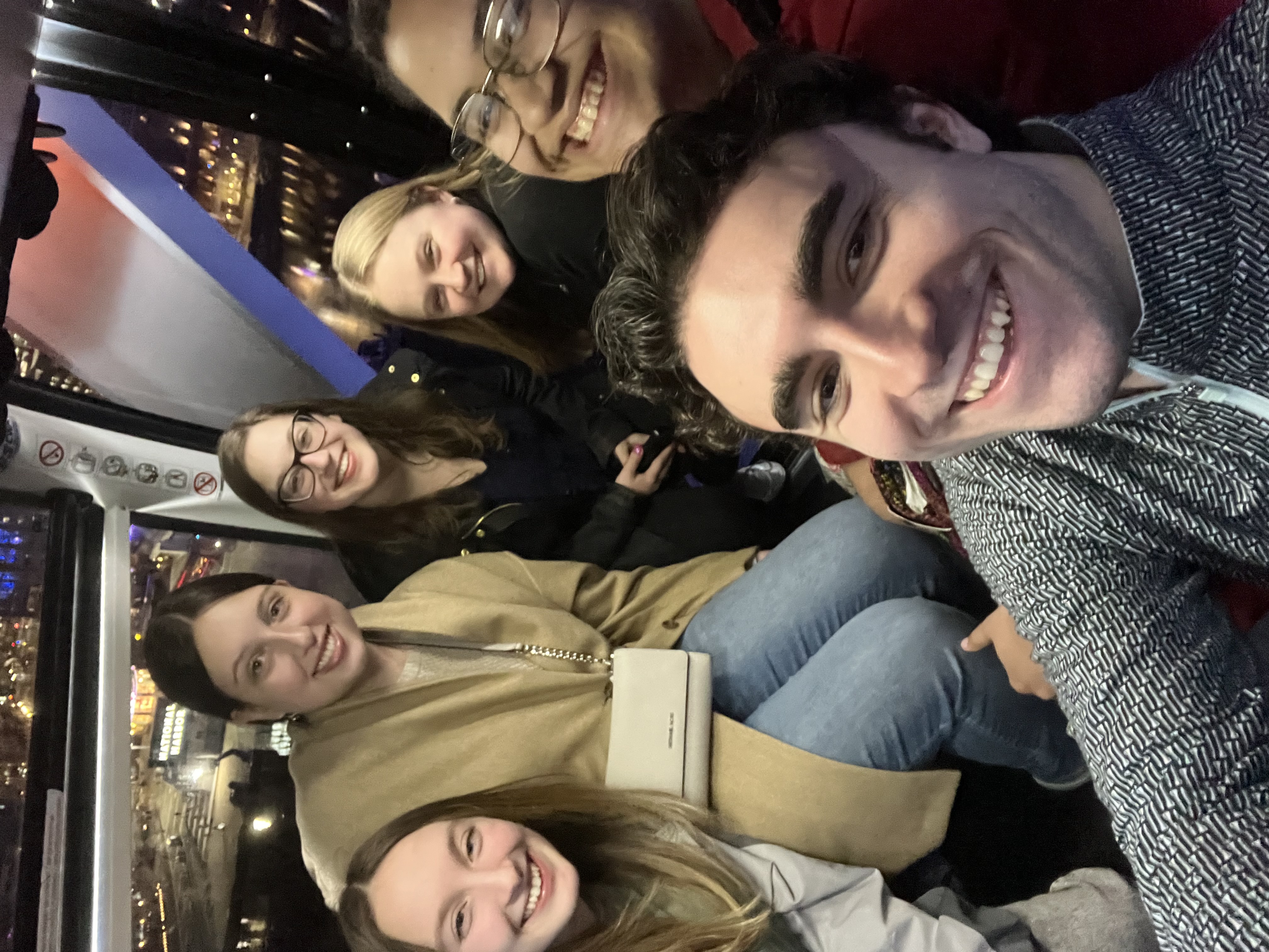 Group of college students taking a selfie.