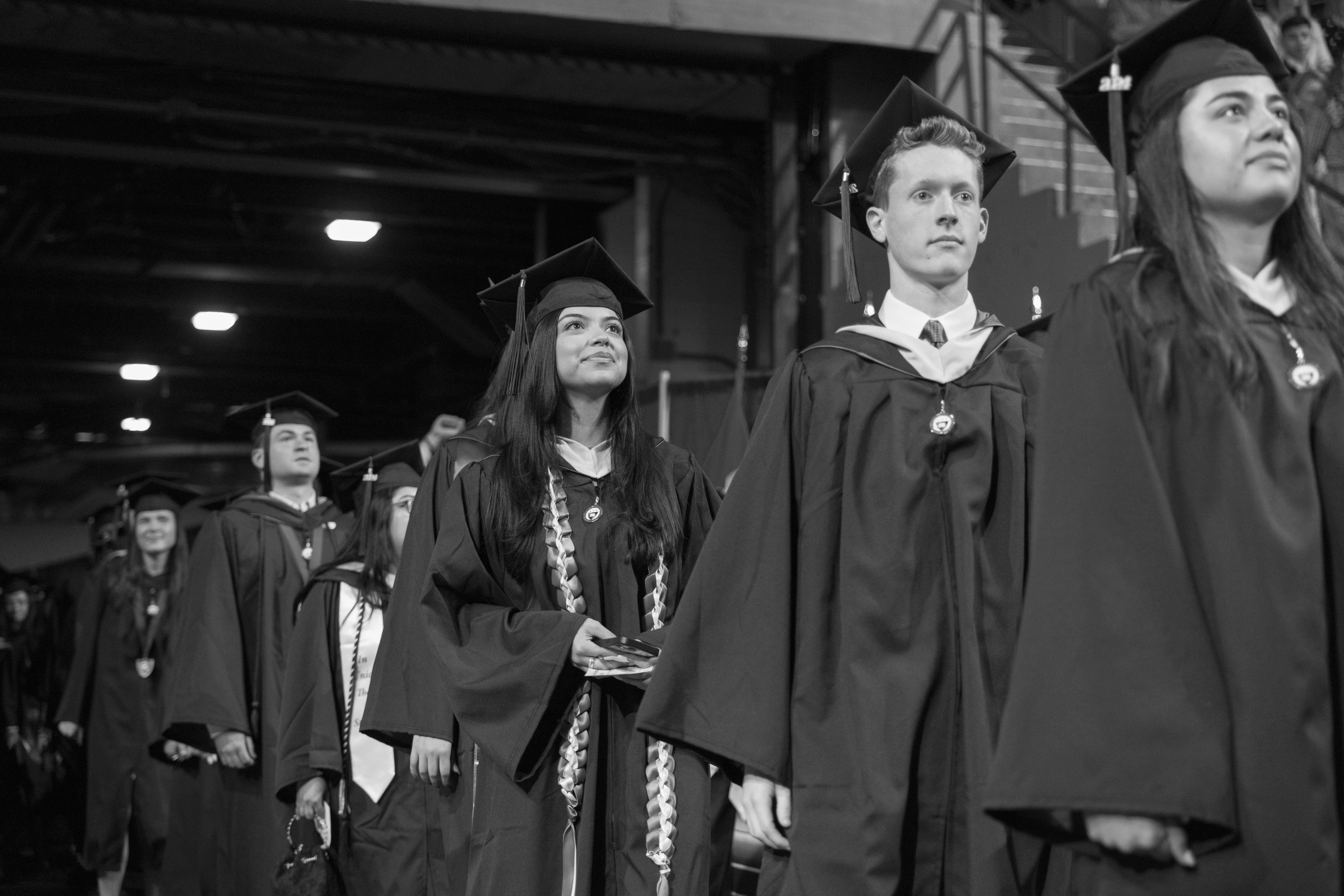 Graduates enter the stadium