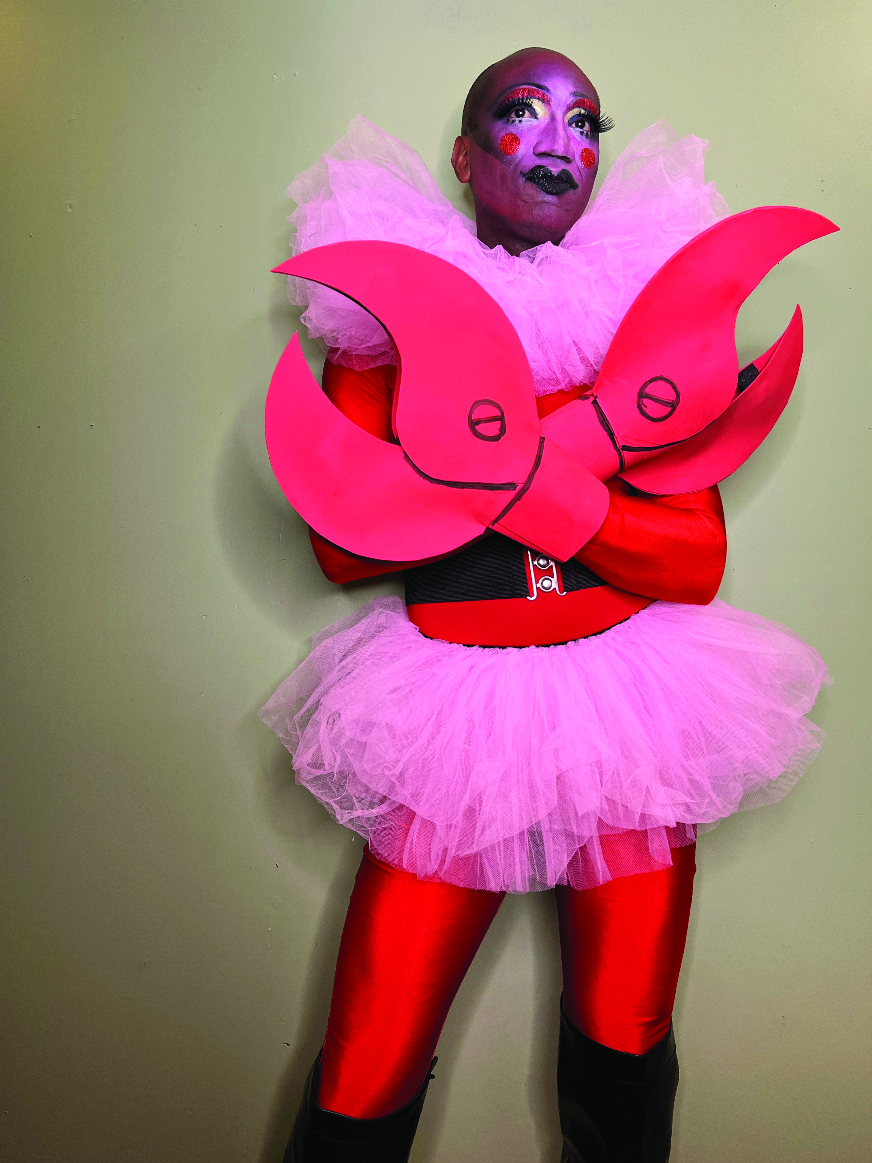 André Isaacs in a costume wearing a pink skirt to appear like HIM from &quot;The Powerpuff Girls&quot;