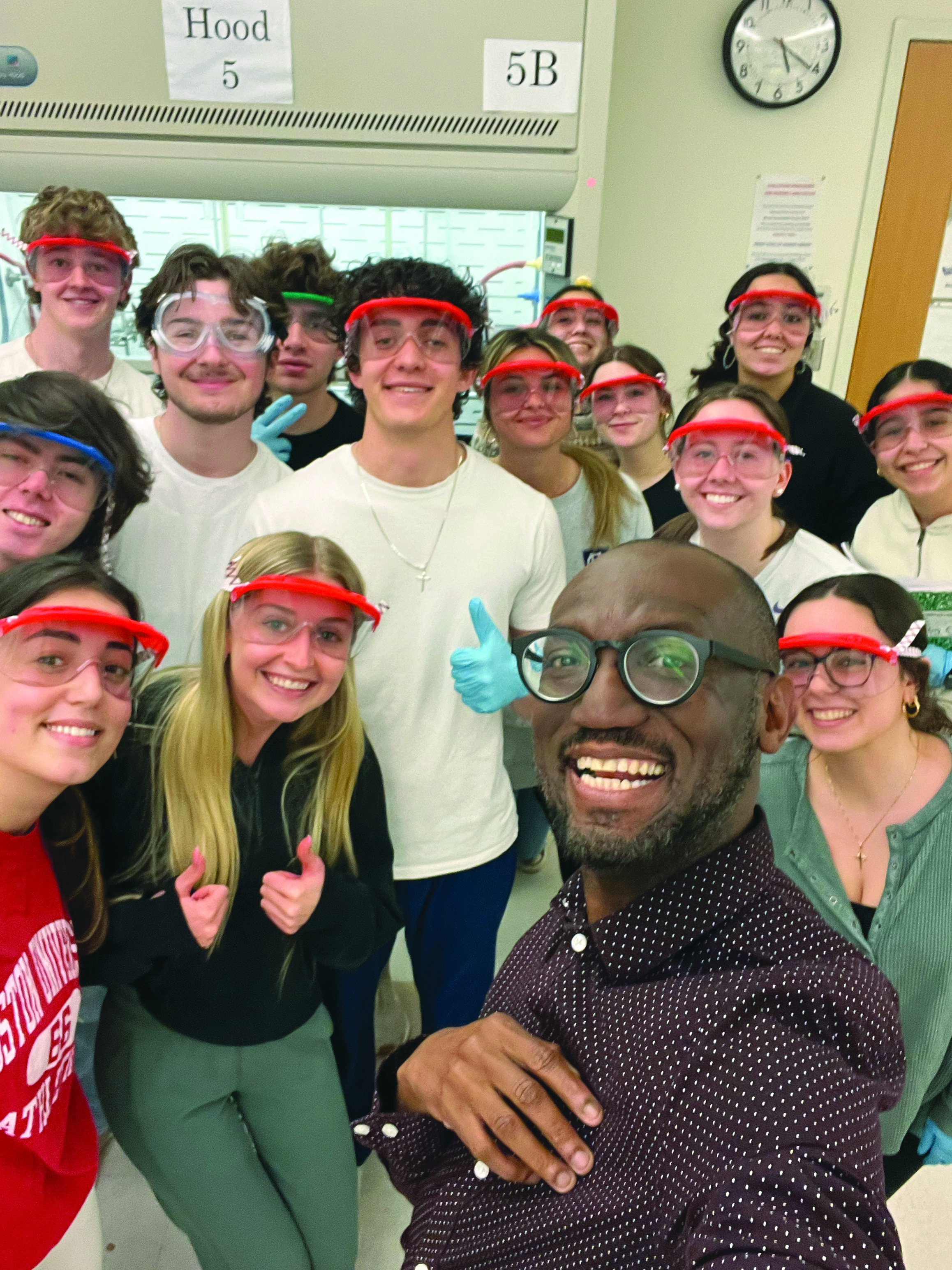 André Isaacs taking a selfie with a group of his chemistry students