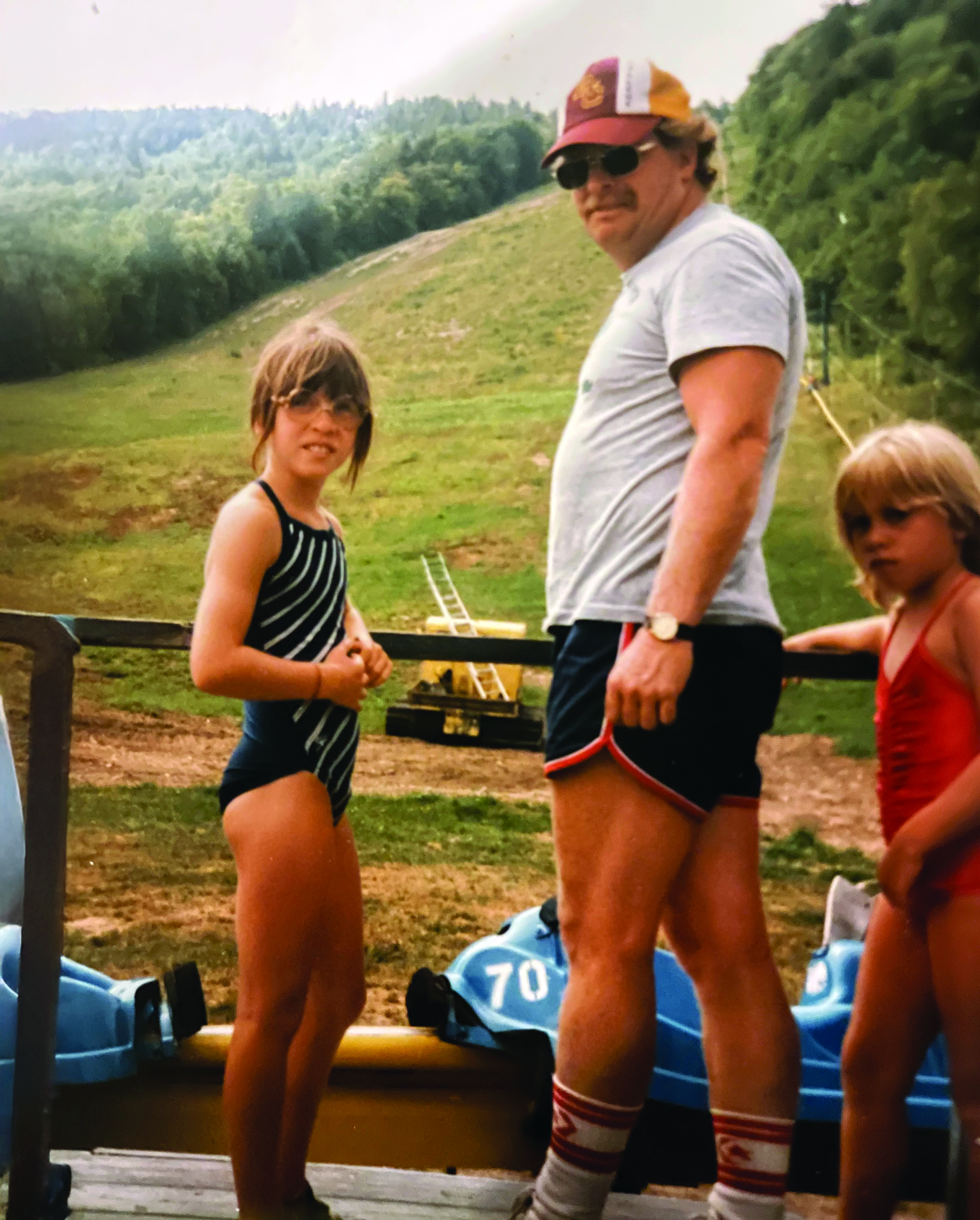 Girl and man look at the camera