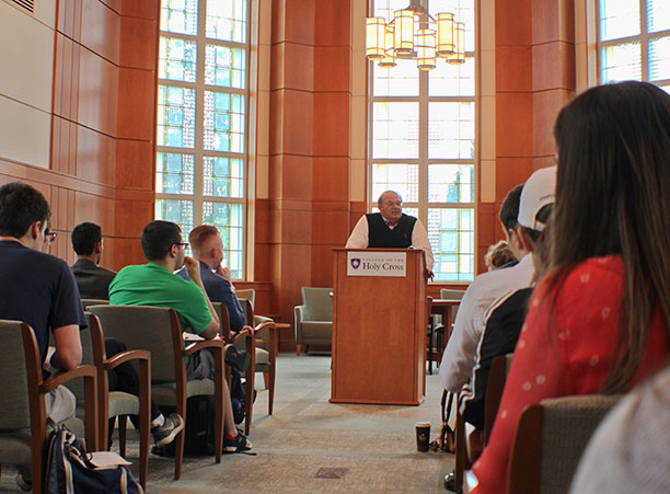 Judge Richard Leon stands in front of students in Rehm Library.