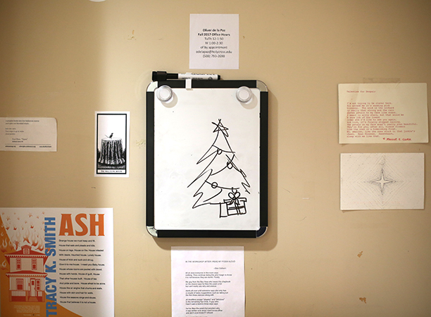Oliver de la Paz, associate professor of English, sports a Christmas trees on his office door.