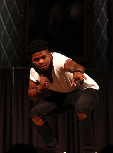 A student strikes a pose on the catwalk during the BSU 20th Annual Fashion Show.