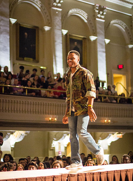 A student walks down the catwalk at the BSU 20th Annual Fashion Show.