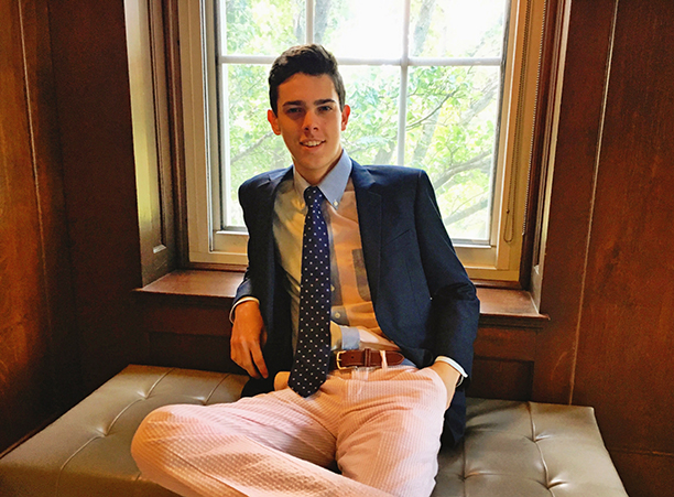 Riley Benner '19, founder of Phoenix Haberdashery, which employs Syrian refugees to craft reversible neckties.