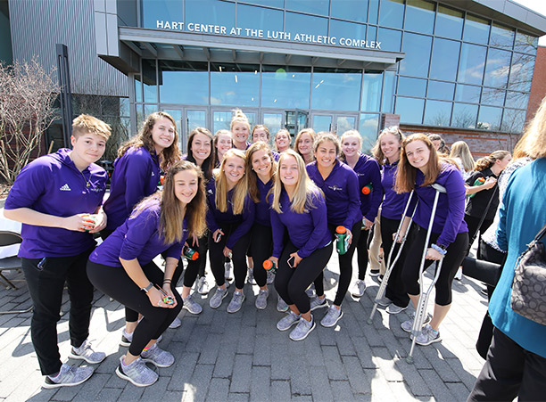 Current student-athletes join in on the celebrations for the dedication of the new athletic complex.
