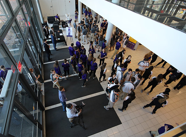 Attendees walk through the main entryway of the new Hart Center at the Luth Athletic Complex during the dedication celebrations.