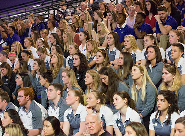 Student-athletes fill the bleachers during the dedication ceremonies for athletic complex.