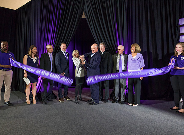 John Luth ’74 and Joanne Chouinard-Luth cut the ribbon marking the official opening of the Hart Center at the Luth Atheltic Complex.