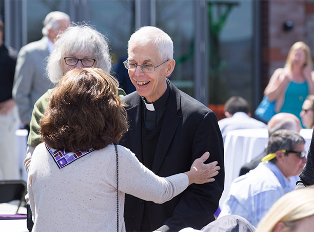Rev. Michael C. McFarland, S.J., former president of Holy Cross, attends the dedication of the new athletic complex.