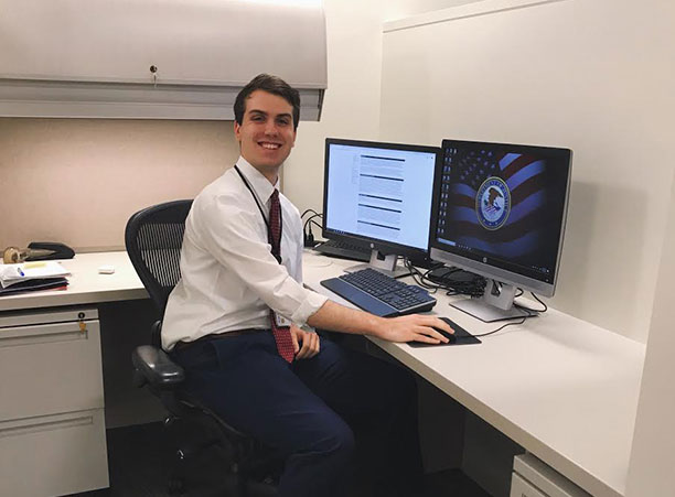 A student sits at a desk