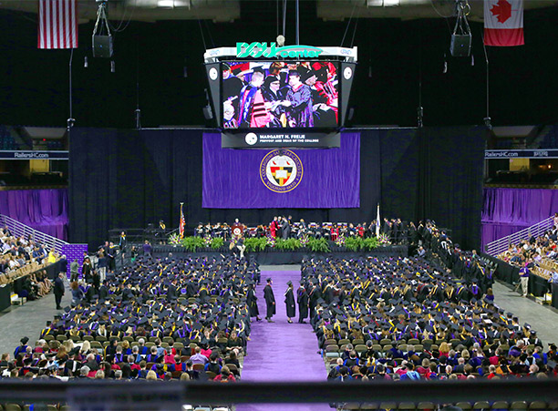Students make their way to the stage.