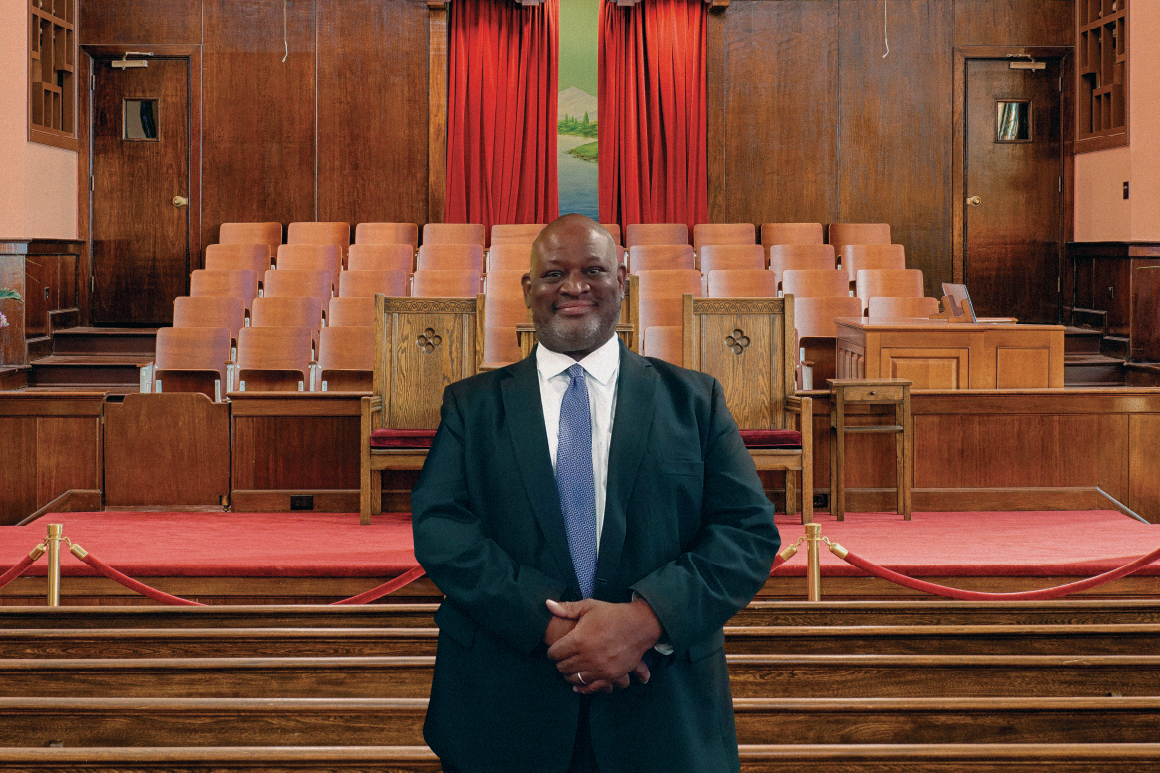 Rev. Vaughn stands in the Ebenezer Baptist Church's famous sanctuary.