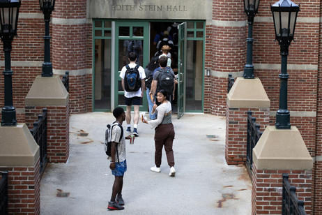 Student(s) walking on a college campus