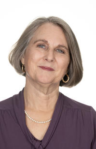 Close up portrait of a woman with a white background
