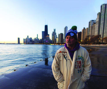 Man in robe and ski hat