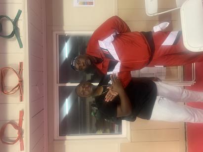 Martell Audate poses with Masta Killa of the Wu-Tang Clan