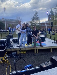 Henry, Emma, Ellie and Benjamin on stage for Battle of the Bands (2024)