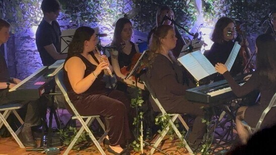 Elaine playing music