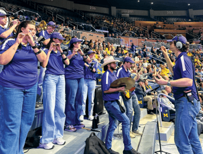 Pep band performing in the stands