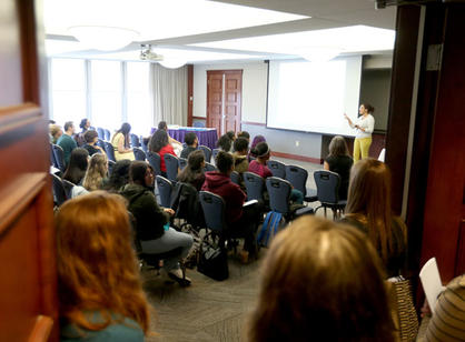 Mariel Aleman '18 presents her capstone titled "Lawrence MA: Un Hogar Lejos de Casa con una Identity Dominicana” to a full room during the Latin American and Latino studies session of the Academic Conference.