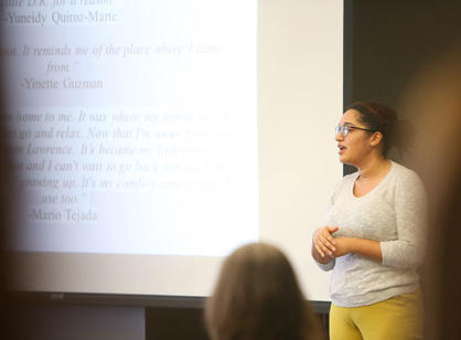 Mariel Aleman '18 presents her capstone on "Lawrence MA: Un Hogar Lejos de Casa con una Identity Dominicana” to a full room during the Latin American and Latino studies session of the Academic Conference.