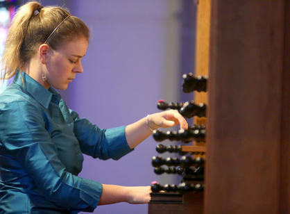 Organ scholar Lorraine Mihaliak '19 presents and performs "There and Bach Again” in St. Joseph Memorial Chapel during the Academic Conference