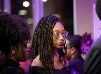 A BSU member stands at the celebratory dinner