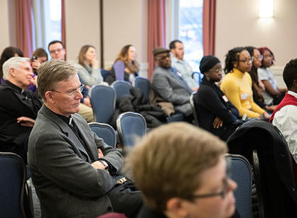 Composer Jeremy Flower (left) and Mark DeChiazza speak to Rachelle Beaudoin's digital arts class.