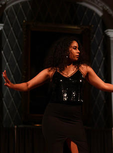 A student strikes a pose while walking down the catwalk at the BSU 20th Annual Fashion Show.