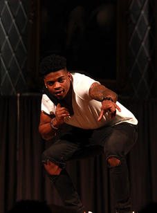 A student strikes a pose on the catwalk during the BSU 20th Annual Fashion Show.