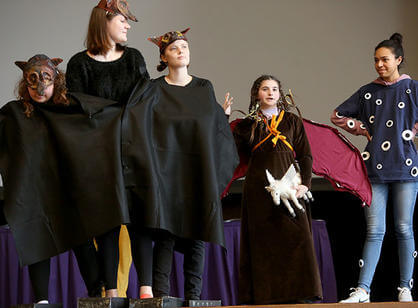 Ursuline Academy students compete dressed up as mythical monsters Cerberus, Medusa and Argus.