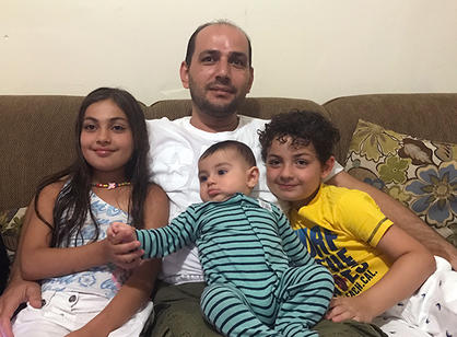 After fleeing his home in Aleppo and making his way to the United States with his family, Edris Omar now works with Riley Benner making neckties for Phoenix Haberdashery