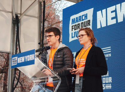 Clavering and Kelly Rogers, an 18-year-old student at The City University of New York and New York City March creative director, address the crowd