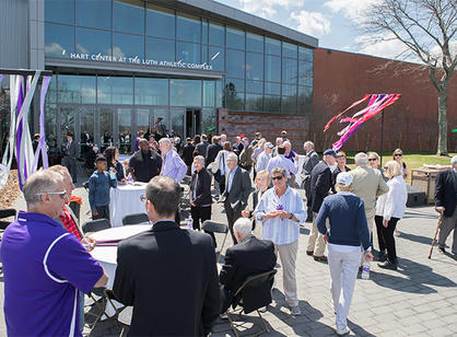 The Holy Cross community gathers to celebrate the dedication of the new Hart Center at the Luth Athletic Complex.