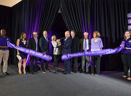 John Luth ’74 and Joanne Chouinard-Luth cut the ribbon marking the official opening of the Hart Center at the Luth Atheltic Complex.