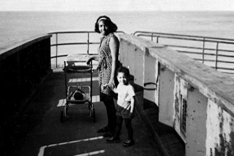 Rougeau takes a walk with his mom, Shirley, and sister, Niki (in stroller), on the Lake Michigan Crosswalk in 1966.