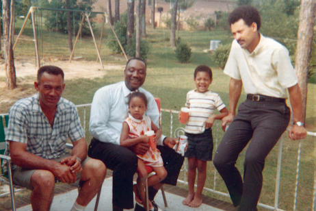 Rougeau is seen here in 1967 with his grandfather, John Rougeau, neighbor Mr. Morgan, father, Weldon, and Niki.