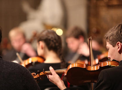 A student violinist performs during Advent Festival of Lessons &amp; Carols.