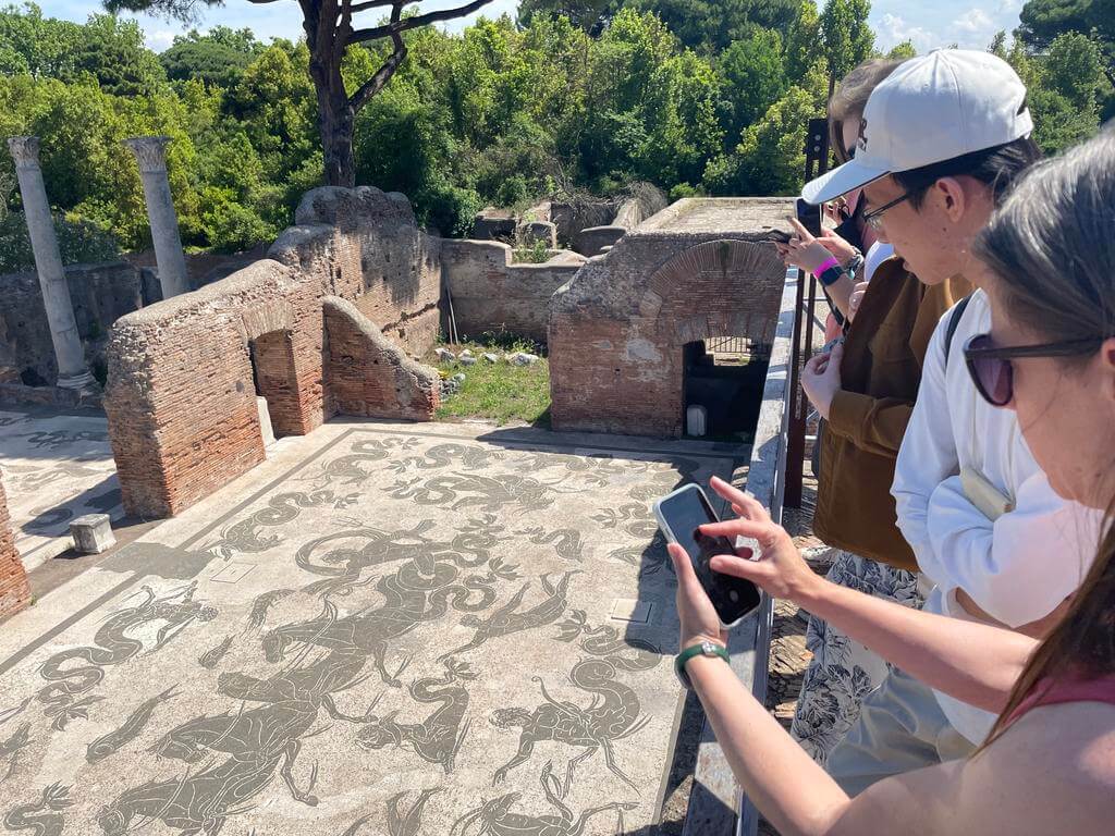 People view an ancient Roman mosaic