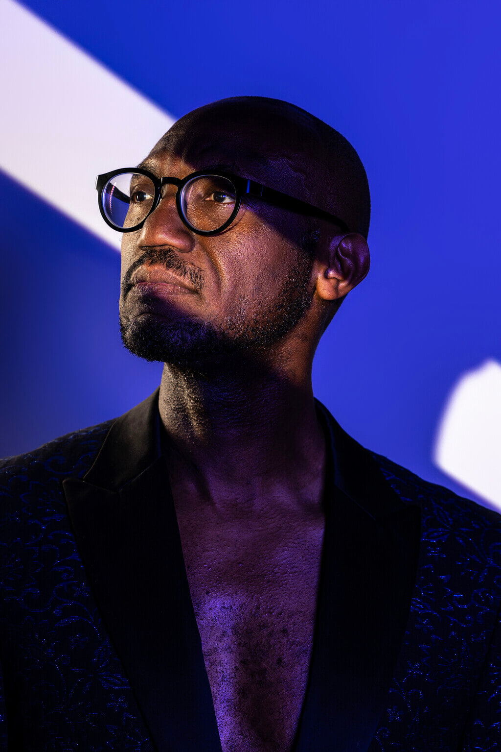 Black man with glasses