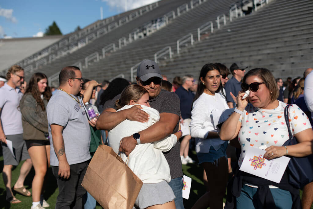 A parent and child hug