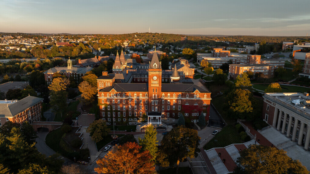 Aerial shot of sun setting over brick buildings