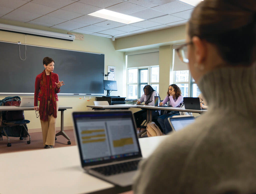 Mary Roche teaching in front of a class