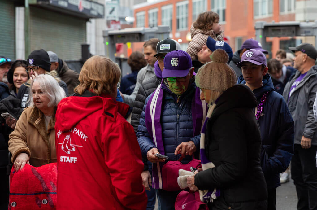 Fans scanning tickets to enter Fenway Park